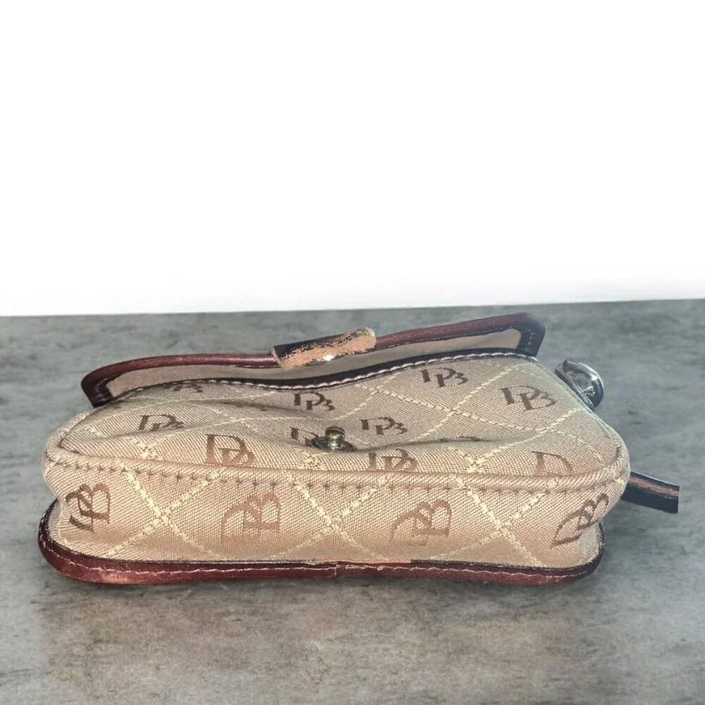 Dooney & Bourke Brown Wristlet Clutch Wallet Leather Wrist Strap Signature Logo